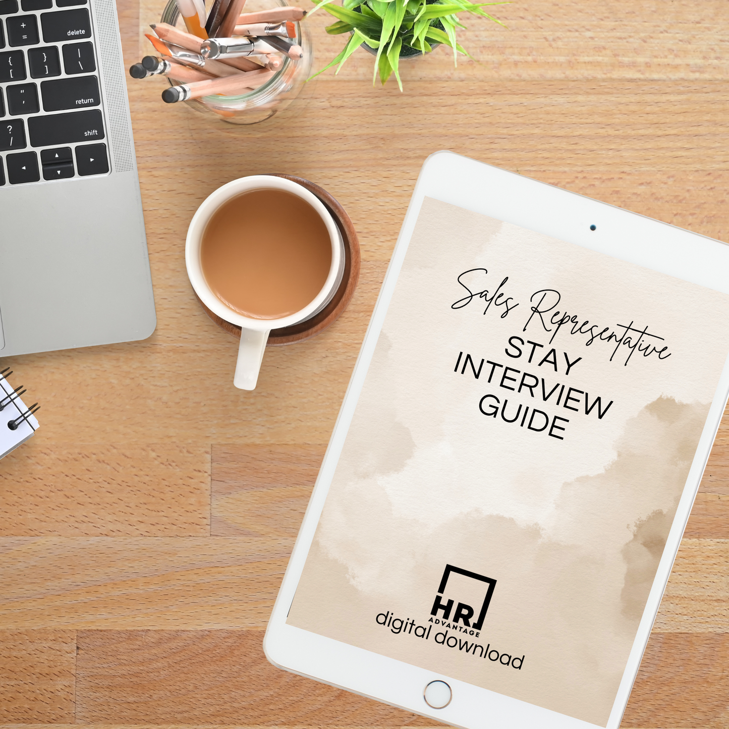Computer and tablet displaying a digital template titled 'Sales Representative Stay Interview Guide,' showcasing a professional document layout for HR use