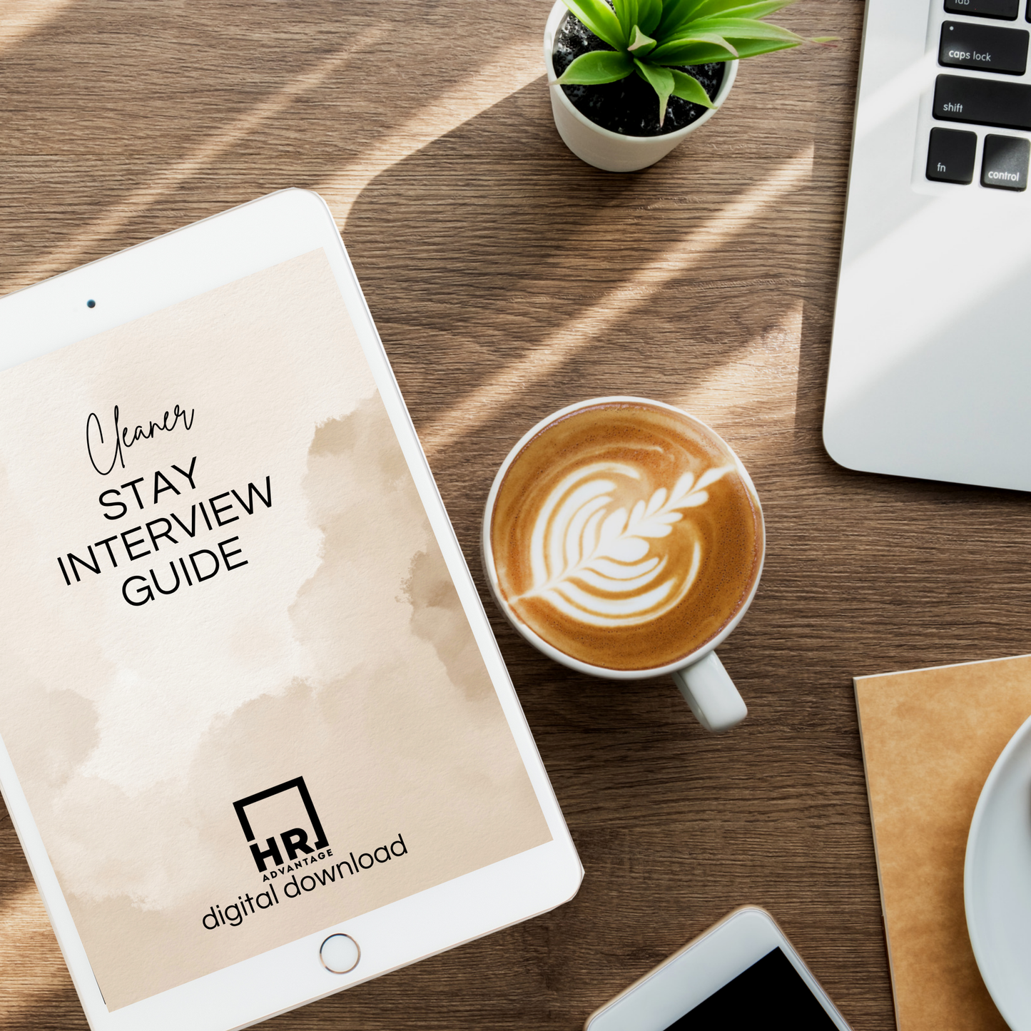 Computer and tablet displaying a digital template titled 'Cleaner Stay Interview Guide' showcasing a professional document layout for HR use